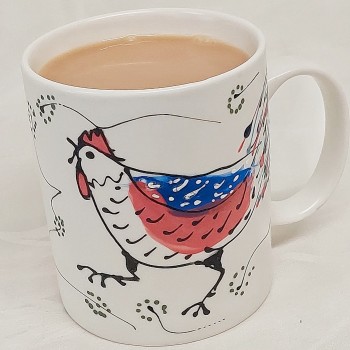 Chicken mug with tea